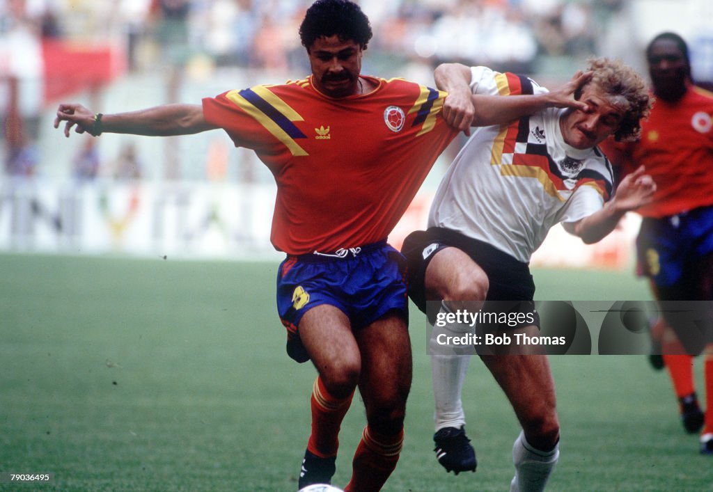 1990 World Cup Finals. Milan, Italy. 19th June, 1990. Colombia 1 v West Germany 1. Colombia's Gildardo Gomez battles for the ball with West Germany's Rudi Voeller.