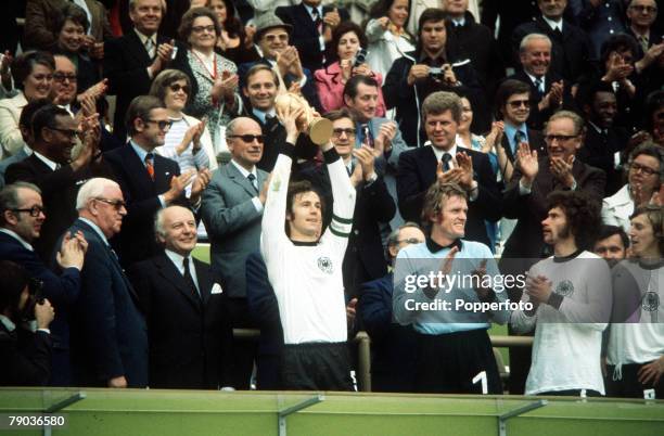 World Cup Final, Munich, West Germany, 7th July West Germany 2 v Holland 1, West German captain Franz Beckenbauer holds aloft the trophy as his team...