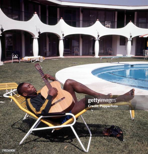 Football, Brazilian legend Pele, one of the stars of the victorious Brazil team of the 1970 World Cup Finals in Mexico, relaxes by the swimming pool...