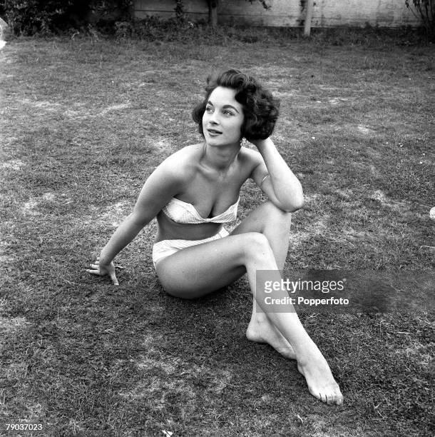London, England British actress Shirley Anne Field poses in a bikini at Roehampton swimming pool