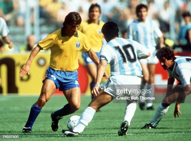 World Cup Finals, Second Phase, Turin, Italy, 24th June Argentina 1 v Brazil 0, Brazil's Dunga on the ball faced by Argentina's Diego Maradona