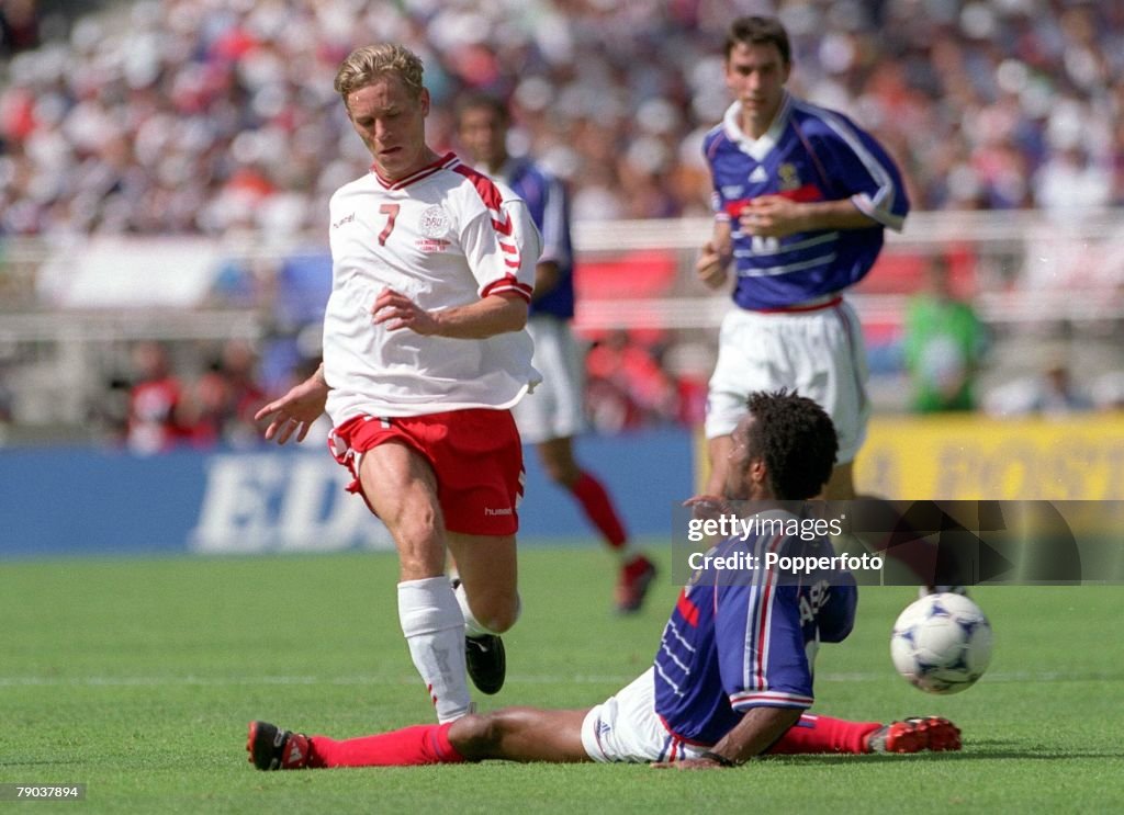 1998 World Cup Finals. Lyon, France. 24th June, 1998 France 2 v Denmark 1. France's Christian Karembeu with Denmark's Allan Nielsen.