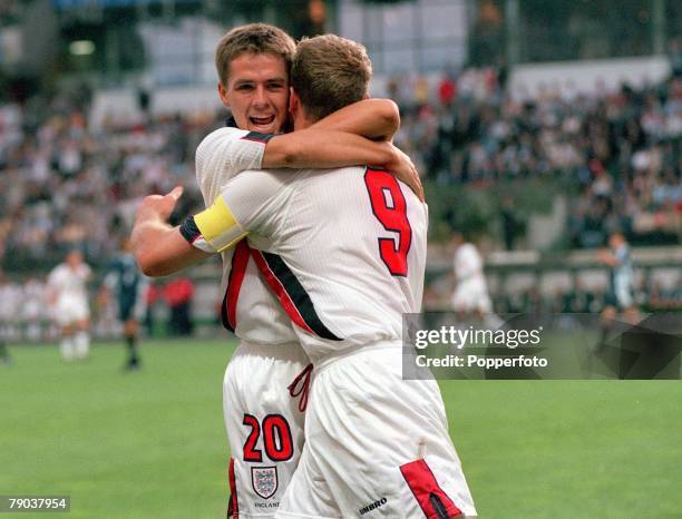 World Cup Finals, St, Etienne, France 30th June England 2 v Argentina 2, , England's Michael Owen hugs Alan Shearer after Shearer scored England's...