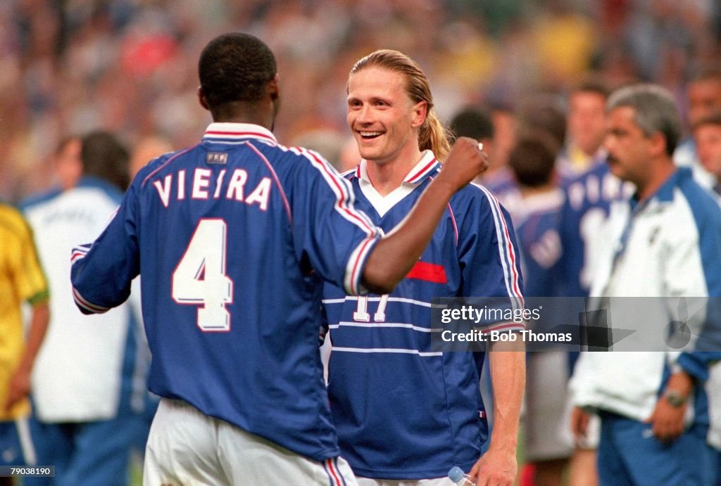 1998 World Cup Final. St. Denis, France. 12th July, 1998. France 3 v Brazil 0. France's Emmanuel Petit (R) and Patrick Vieira enjoy the moment of victory .