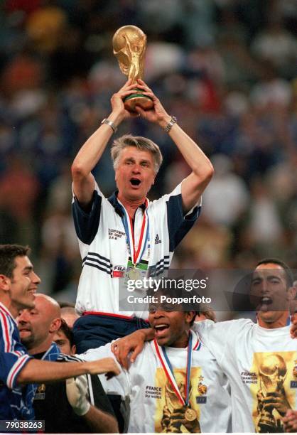 World Cup Final, St, Denis, Paris, France, 12th July France 3 v Brazil 0, French coach Aime Jacquet lifts the trophy after their historic win