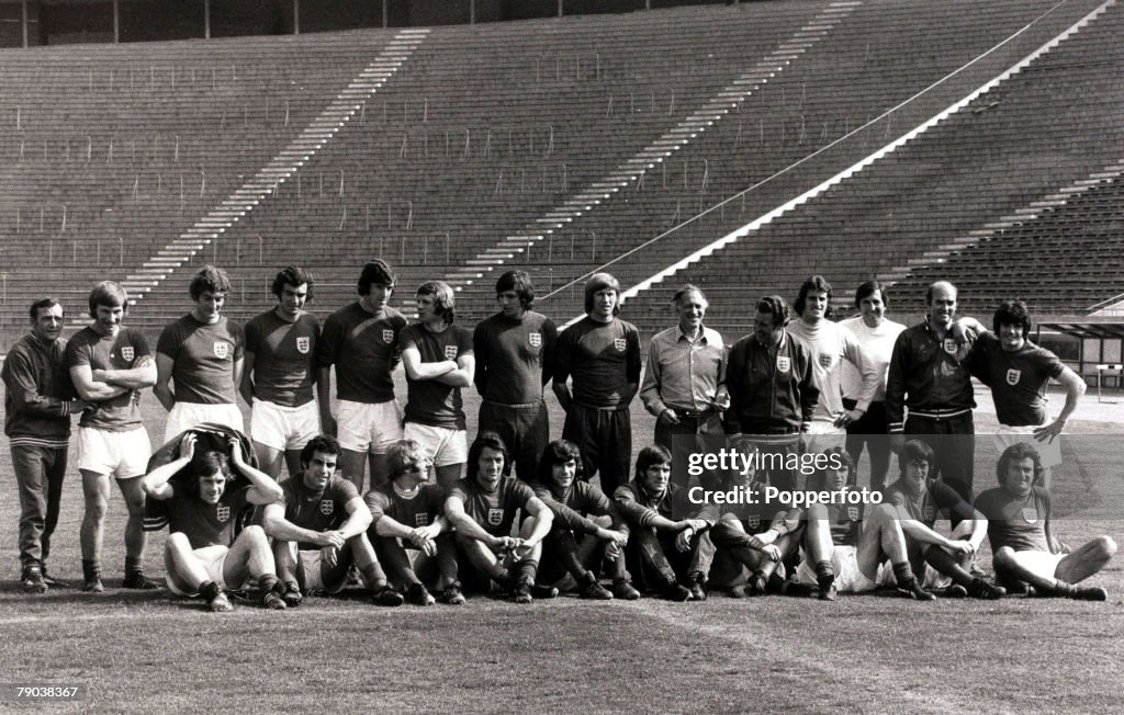 Sport. Football. 4th June 1974. The England players and staff pose for a picture in Belgrade the day before their 2-2 draw against Yugoslavia. Back row L-R: Les Cocker Colin Todd, Martin Dobson Trevor Brooking, David Mills, Martin Peters, Colin Bell, Mana