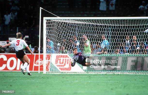 World Cup Semi Final, Turin, Italy, 4th July West Germany 1 v England 1 , West Germany's goalkeeper Bodo Illgner dives to save Stuart Pearce's...