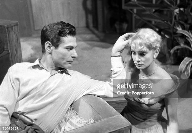 England American actor Sam Wanamaker and Diane Cilento in a scene from the play "Winter Journey"