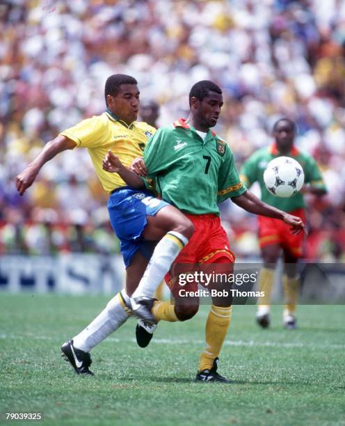 World Cup Finals, Stanford, USA, 24th June Brazil 3 v Cameroon 0, Cameroon's Omam Biyick with Brazil's Mauro Silva