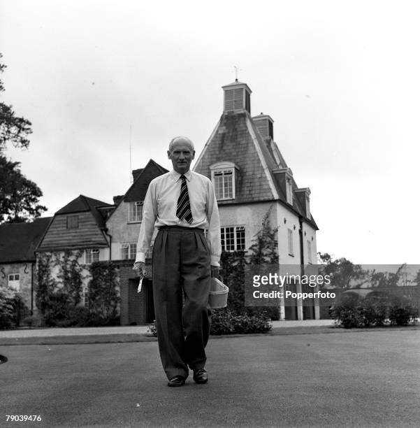 Isington, Hampshire, England Field Marshal Viscount Montgomery is pictured in the garden of his home