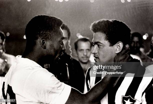 Sport, Football in South America,August 1963, Brazil team-mates Pele and Garrincha on opposite sides in a game, Pele for Santos and Garrincha for...