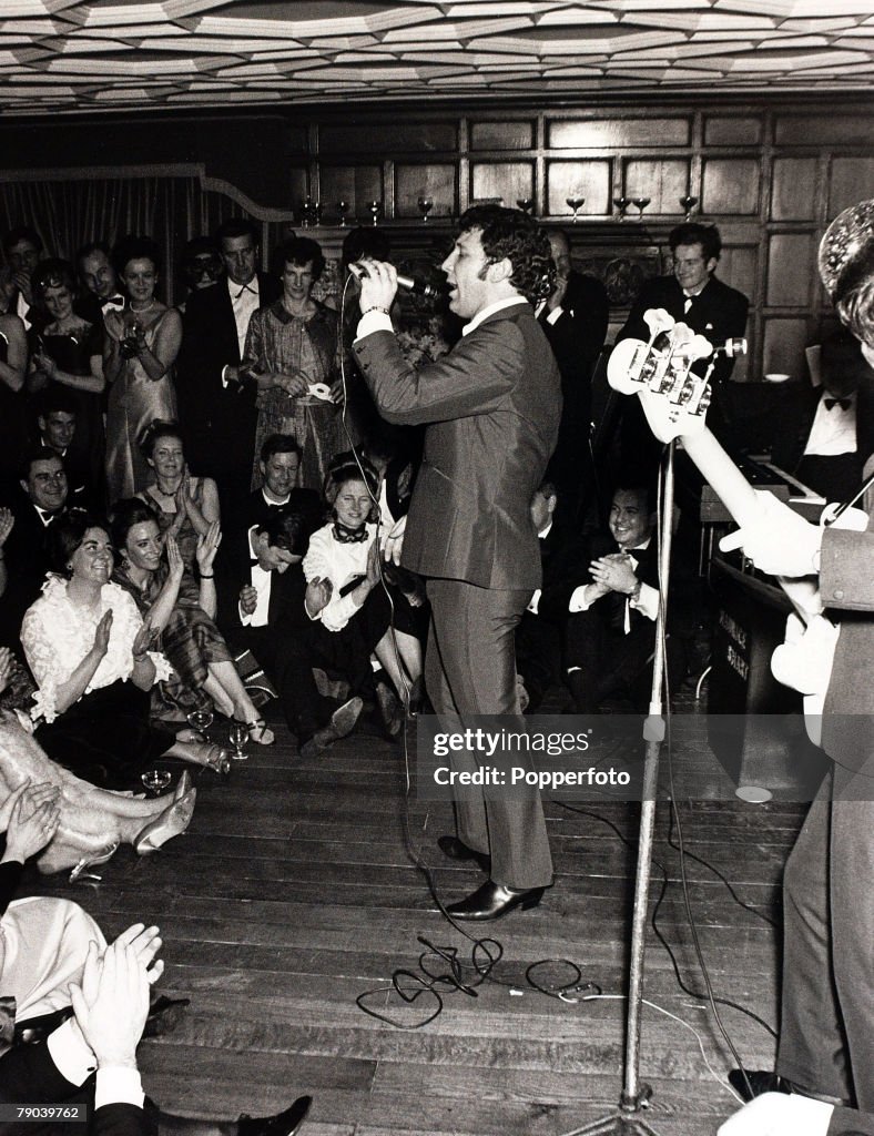 Music. High Wycombe, England. 11th February 1967. Welsh pop singer Tom Jones entertaining an enthusiastic audience at a charity ball.