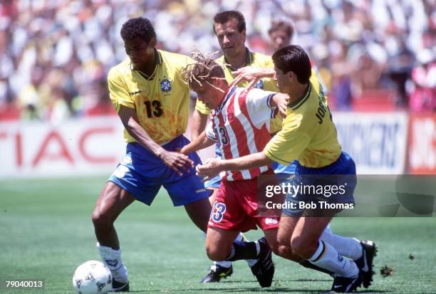 World Cup Finals, Stanford, USA, 4th July Brazil 1 v USA 0, USA's Cobi Jones is surrounded by Brazilian defenders Aldair , Dunga and Jorghino during...