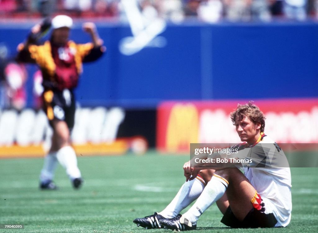 1994 World Cup Quarter-Finals. New Jersey, USA. 10th July, 1994. Bulgaria 2 v Germany 1. Guido Buchwald sits dejected on the pitch after his team were eliminated from the competition