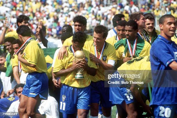 World Cup Final, Pasadena, USA, 17th July Brazil 0 v Italy 0, , Brazil's Romario kisses the World Cup trophy embraced by captain Dunga as Brazil...