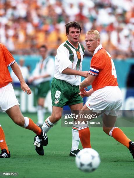 World Cup Finals, Orlando, USA, 4th July Holland 2 v Republic of Ireland 0, Ireland's Ray Houghton watches the ball with Holland's Ronald Koeman