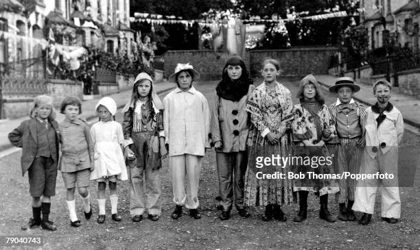 Postcards, World War I, 27th August 1919, England, The children of Millfield road in York wearing Fancy dress for the street party held in...