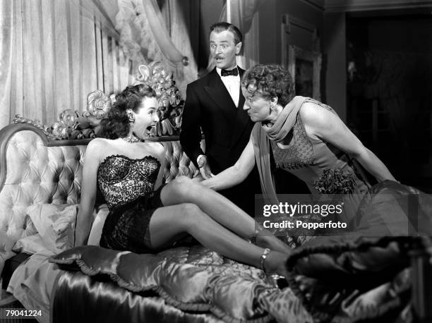 Cinema Personalities, pic: 1949, Patricia Roc, Nigel Patrick and Phillipa Gill in a scene from the film "Perfect Lady"