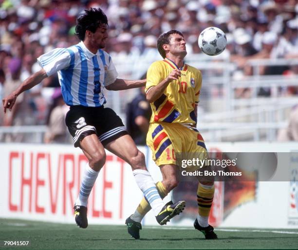 World Cup Finals, Los Angeles, USA, 3rd July Romania 3 v Argentina 2, Romania's Gheorghe Hagi is challenged by Argentina's Chamot