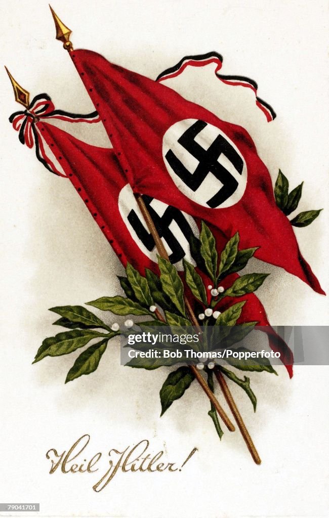 Colour postcard. Nazi postcard shows flags with the swastika. circa 1930