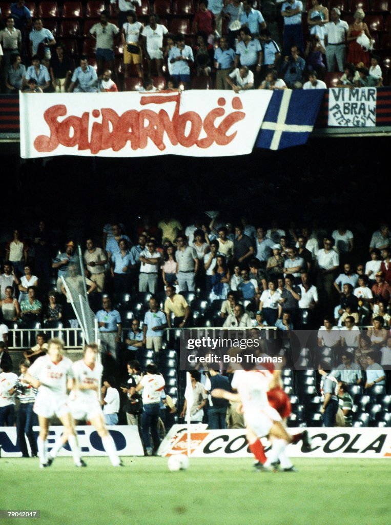 1982 World Cup Finals. Barcelona, Spain. 4th July, 1982. Poland 0 v USSR 0. Polish fans lift a political "Solidarity" banner during the match.
