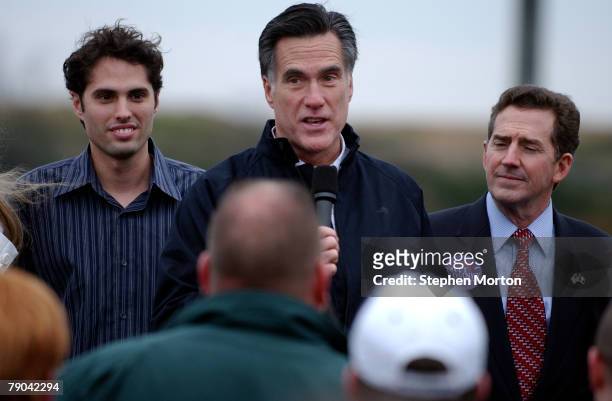 Republican Presidential hopeful former Massachusetts Gov. Mitt Romney addresses a small crowd of supporters while U.S. Sen. Jim DeMint and Romney's...