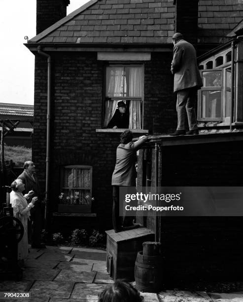 London, England A scene from the Ealing comedy film "The Ladykillers", Pictured are L-R: Katie Johnson, Danny Green, Herbert Lom , Peter Sellers, and...