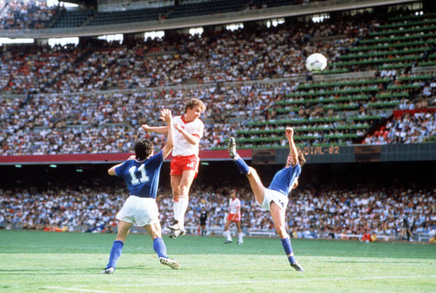 World Cup Finals, Semi-Final, Barcelona, Spain, 8th July Italy 2 v Poland 0, Italy's Marco Tardelli and Gabriele are outjumped for the ball by...