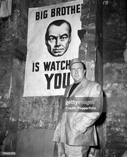 Stepney, London, England American actor Edmund O'Brien is pictured in a scene from the film "1984", based on the book by George Orwell