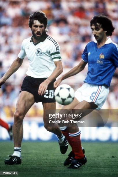 World Cup Finals, Semi-Final, Seville, Spain, 8th July West Germany 3 v France 3, , West Germany's Manny Kaltz challenges France's Bernard Genghini...