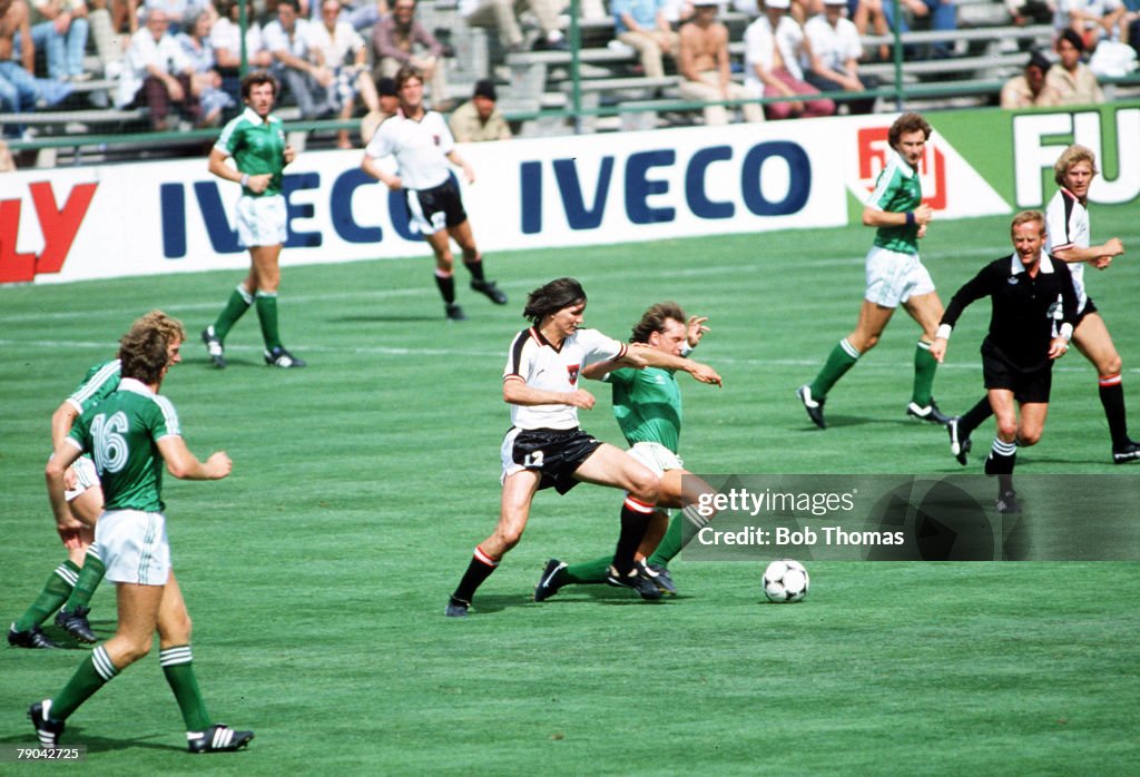 1982 World Cup Finals. Madrid, Spain. 1st July, 1982. Austria 2 v Northern Ireland 2. Northern Ireland's David McCreery is tackled by Austria's Anton Pichler.
