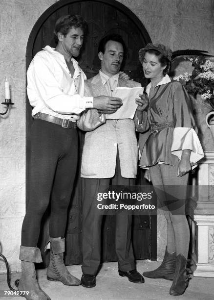 England Pictured on the set of the film "Men of Sherwood Forest" are L-R: Don Taylor, Director Val Guest and Eileen Moore