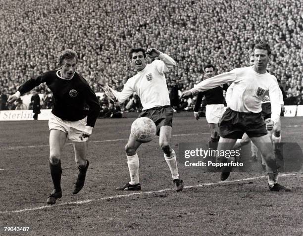 Sport, Football, 2nd April 1966, Home International Championship, Hampden Park, Glasgow, Scotland 3 v England 4, Scotland's Denis Law gets past...