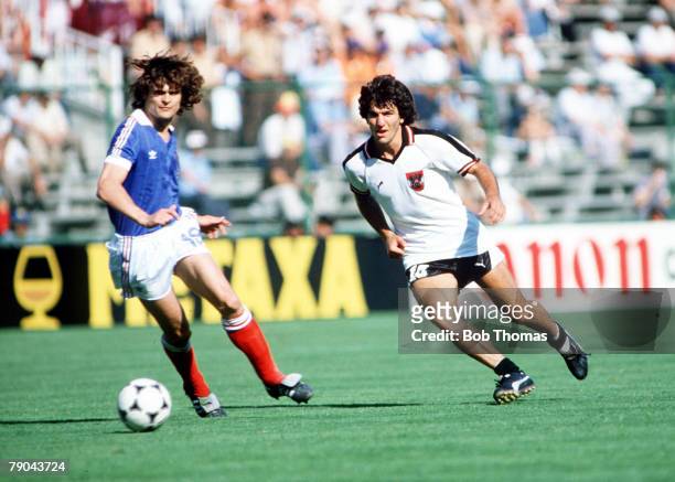 World Cup Finals, Second Phase, Madrid, Spain, 28th June France 1 v Austria 0, France's Didier Six goes for the ball with Austria's Reinhold...