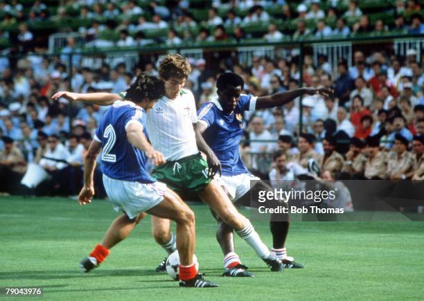 World Cup Finals, Second Phase, Madrid, Spain, 4th July France 4 v Northern Ireland 1, France's Manuel Amoros and Marius Tresor challenge Northern...