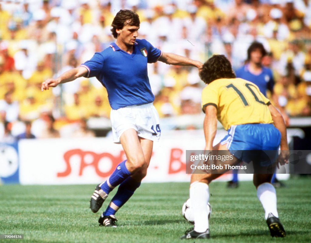 1982 World Cup Finals. Second Phase. Barcelona, Spain. 5th July, 1982. Italy 3 v Brazil 2. Italy's Marco Tardelli is faced by Brazil's Zico.