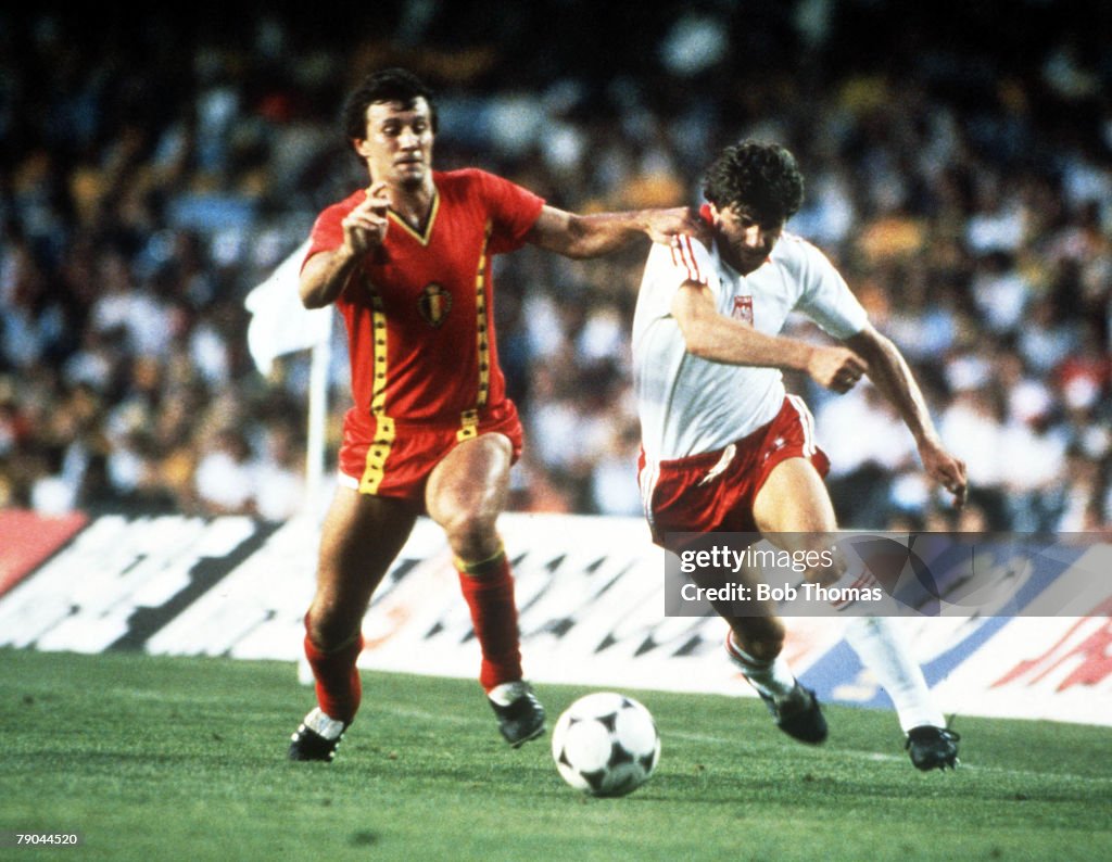 1982 World Cup Finals. Second Phase. Barcelona, Spain. 28th June, 1982. Poland 3 v Belgium 0. Poland's Wlodzimierz Smolarek tackled by Belgium's Michel Renquin.