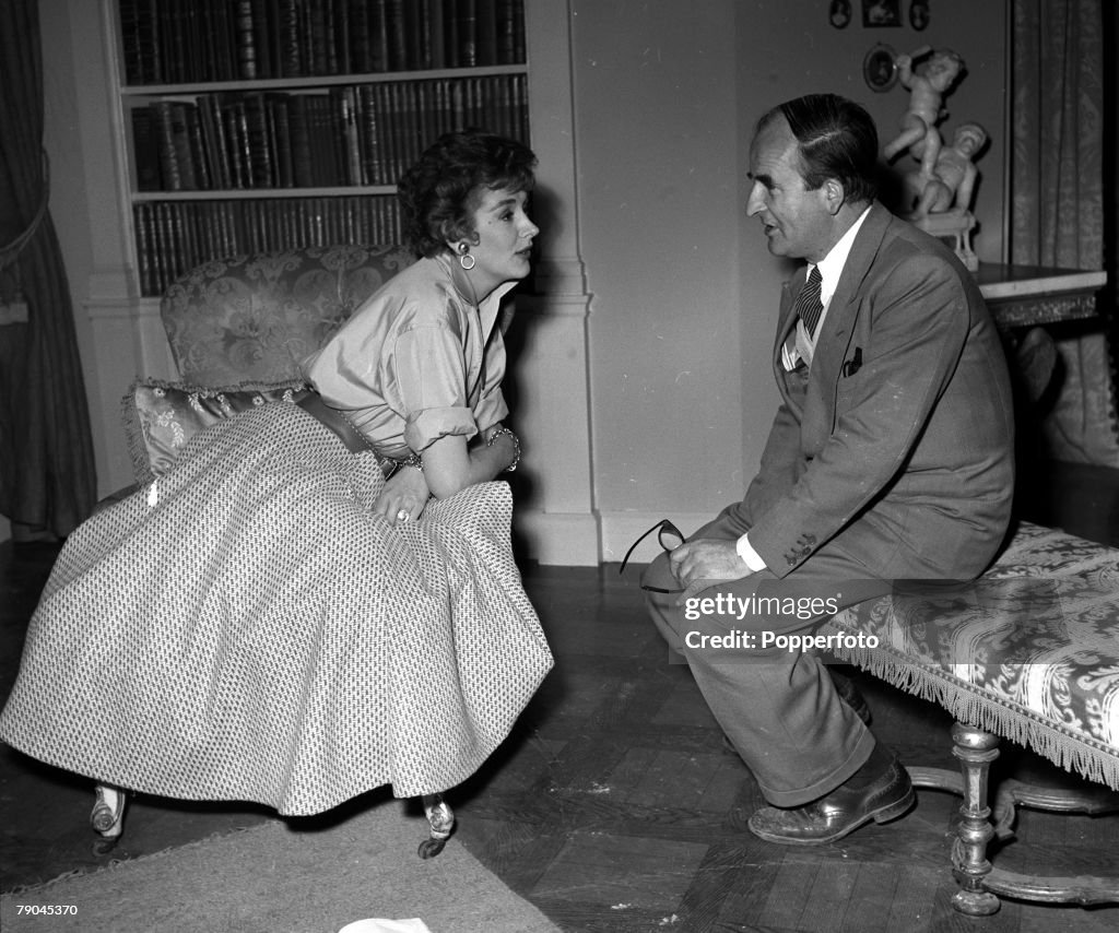 England. 1954. Pictured on the set of the film "The Constant Husband" are actress Kay Kendall and producer Frank Launder.
