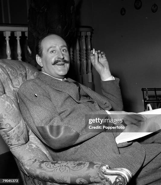 England Actor Cecil Parker is pictured on the set of the film "The Constant Husband"