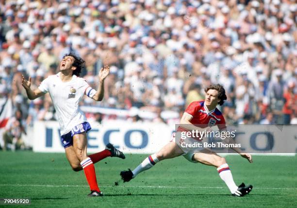 World Cup Finals, Bilbao, Spain, 16th June England 3 v France 1, French captain Michel Platini is caught on the ankle by England's Steve Coppell