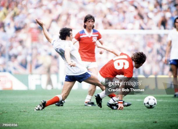 World Cup Finals, Bilbao, Spain, 16th June England 3 v France 1, France's Michel Platini goes in to tackle with England's Bryan Robson