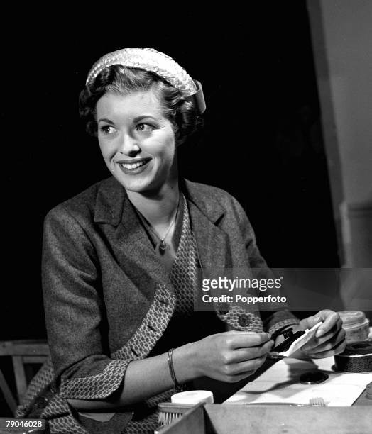 Portrait of British actress Eileen Moore on the set of the film "Mr Denning Drives North"