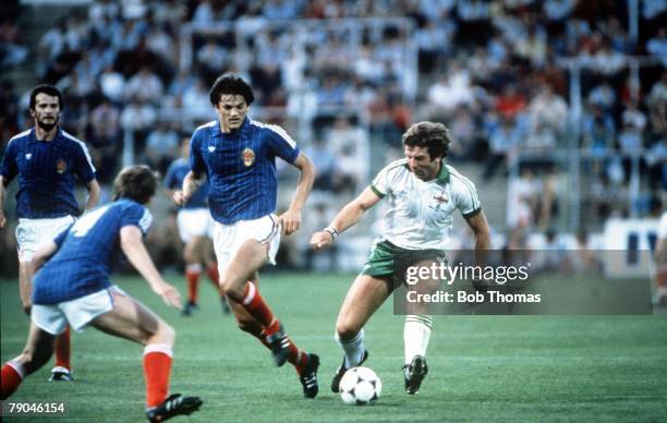 World Cup Finals, Zaragoza, Spain, 17th June Yugoslavia 0 v N,Ireland 0, Northern Ireland's Gerry Armstrong is marked by Yugoslavia's Ivan Gudelj