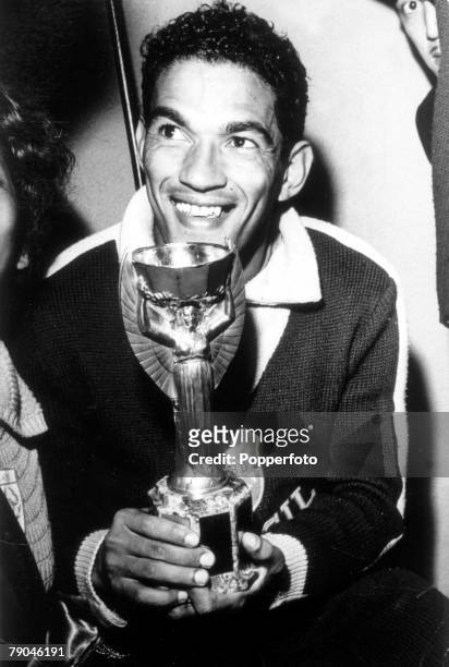 World Cup Final Santiago, Chile, Brazil 3 v Czechoslovakia 1, 17th June Brazilian Garrincha holds the Jules Rimet world cup trophy after his side's...