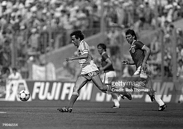 Football, 1982 World Cup Finals, Bilbao, Spain, 16th June 1982, England 3 v France 1, England's Bryan Robson chases France's Michel Platini for the...