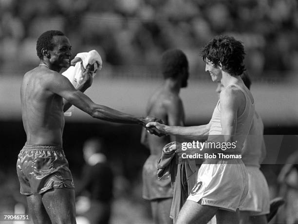 Football, 1982 World Cup Finals, Vigo, Spain, 23rd June 1982, Italy 1 v Cameroon 1, Cameroon's Michel Kaham gleefully exchanges shirts and shakes...