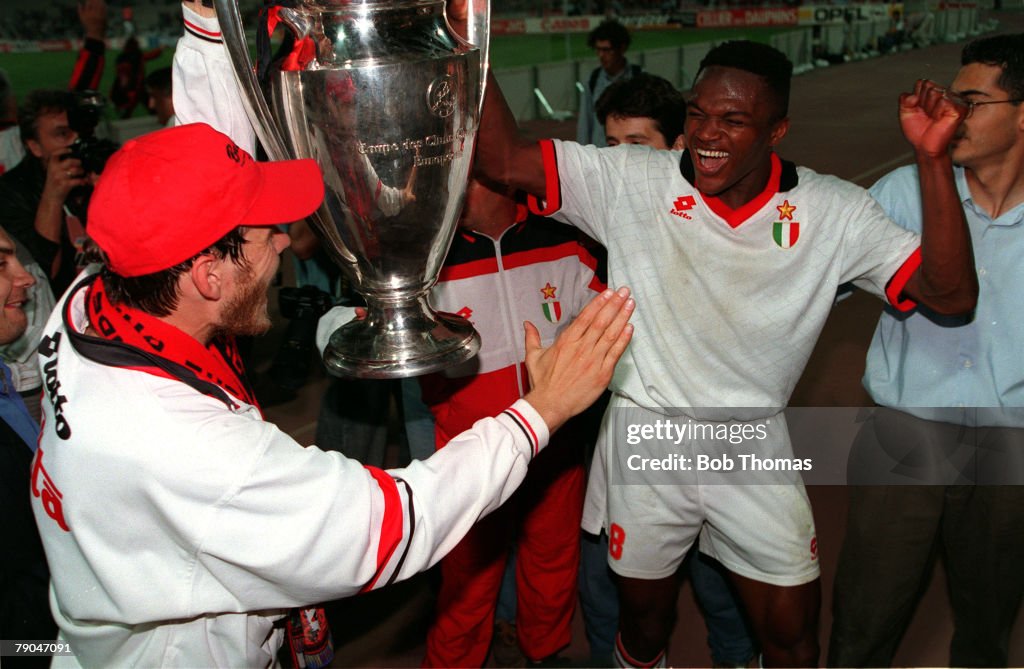 Football. UEFA Champions League Final. Athens, Greece. 18th May 1994. AC Milan 4 v Barcelona 0. AC Milan's Zvonimir Boban (left) and Marcel Desailly celebrate with the trophy.