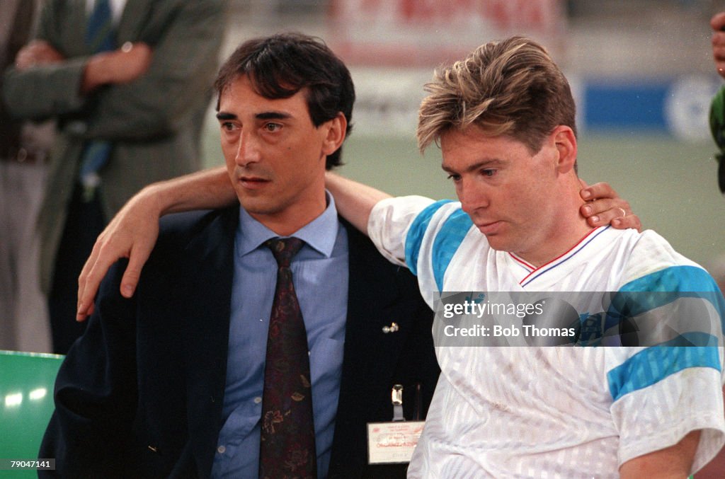 Football. European Cup Final. Bari, Italy. 29th May 1991. Marseille 0 v Red Star Belgrade 0 (after extra time, Red Star win 5-3 on penalties). Marseille's Chris Waddle is consoled after the defeat.