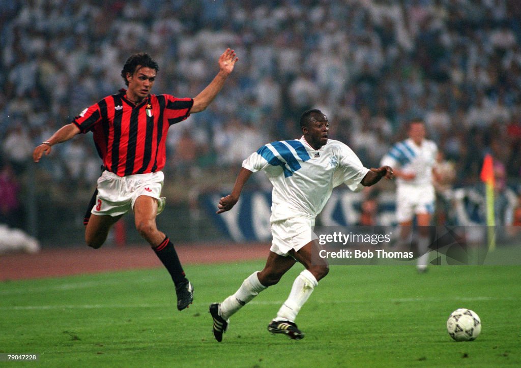 Football. UEFA Champions League Final. Munich, Germany. 26th May 1993. Marseille 1 v AC Milan 0. Marseille's Abedi Pele beats AC Milan's Paolo Maldini.