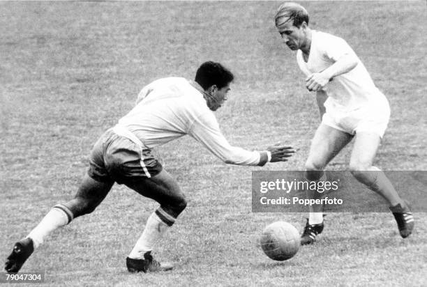 World Cup Quarter-Final Viva Del Mar, Chile, 10th June Brazil 3 v England 1, Brazil's Garrincha is faced by England's Bobby Charlton during the match